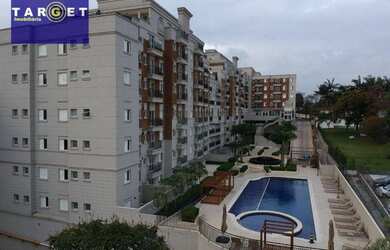 Imagem: O apartamento possui 1 Dormitório, 1 Banheiro, 2 Vagas na garagem