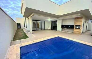 Imagem: A casa em condomínio possui 4 Dormitórios, 5 Banheiros, 4