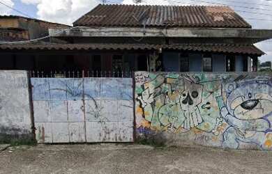 Imagem: A casa possui 3 Dormitórios, 1 Banheiro, 1 Vaga na garagem