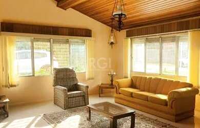 Imagem 7: Casa em Guaíba. Piscina, Churrasqueira, Área de serviçoeLareira