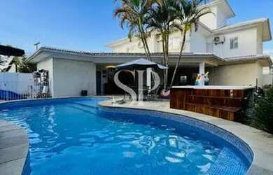 Imagem: A casa em condomínio possui 4 Dormitórios, 5 Banheiros, 4