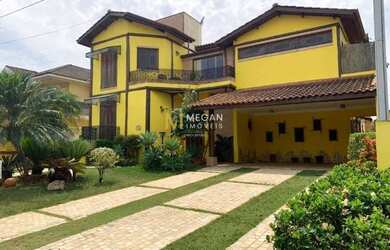 Imagem: A casa possui 4 Dormitórios, 5 Banheiros, 5 Vagas na garagem