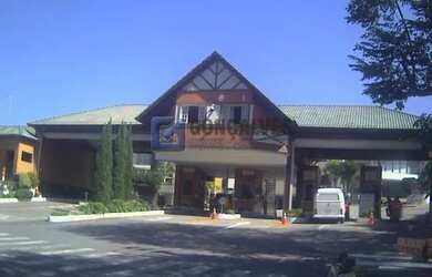 Imagem: A casa possui 5 Dormitórios, 5 Banheiros, 5 Vagas na garagem