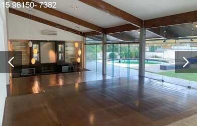 Imagem: A casa possui 4 Dormitórios, 5 Banheiros, 5 Vagas na garagem