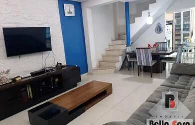 Imagem: A casa possui 3 Dormitórios, 3 Banheiros, 4 Vagas na garagem