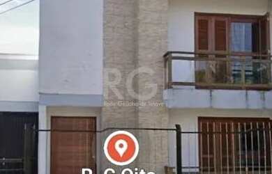 Imagem: A casa possui 3 Dormitórios, 3 Banheiros, 3 Vagas na garagem