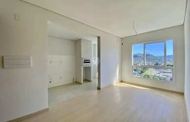 Imagem: O apartamento possui 2 Dormitórios, 1 Banheiro, 2 Vagas na