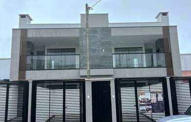 Imagem: A casa possui 3 Dormitórios, 2 Banheiros, 1 Vaga na garagem