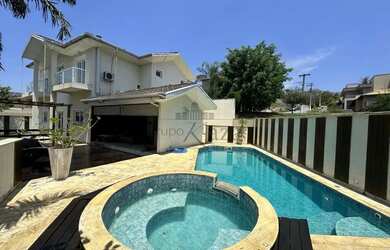 Imagem: A casa em condomínio possui 4 Dormitórios, 5 Banheiros, 4