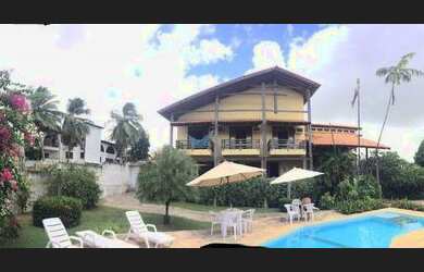 Imagem: A casa possui 5 Dormitórios, 5 Banheiros, 5 Vagas na garagem