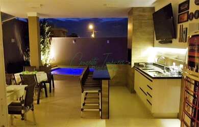 Imagem: A casa em condomínio possui 4 Dormitórios, 5 Banheiros, 4