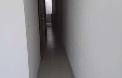 Imagem: A casa possui 2 Dormitórios e 1 Banheiro e está localizado