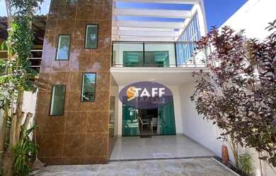 Imagem: A casa possui 4 Dormitórios, 2 Banheiros, 3 Vagas na garagem