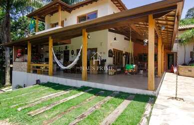 Imagem: A casa em condomínio possui 4 Dormitórios, 5 Banheiros, 5