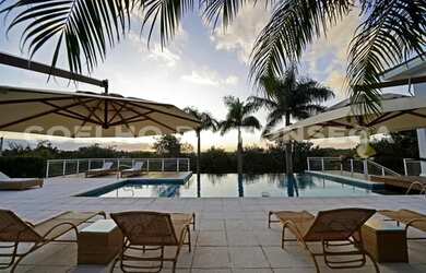 Imagem: A casa em condomínio à venda possui 5 Dormitórios, 5 Banheiros