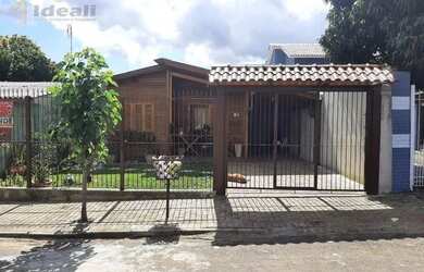 Imagem: A casa à venda possui 3 Dormitórios, 1 Banheiro, 2 Vagas na