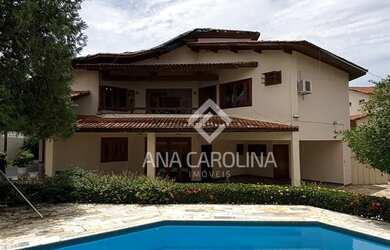 Imagem: A casa possui 4 Dormitórios, 2 Banheiros, 3 Vagas na garagem