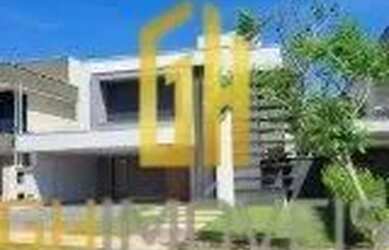 Imagem: A casa possui 4 Dormitórios, 5 Banheiros, 4 Vagas na garagem