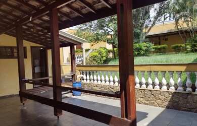 Imagem: A casa possui 3 Dormitórios, 4 Banheiros, 4 Vagas na garagem