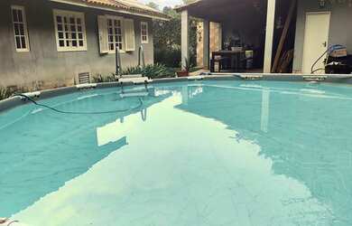 Imagem: A casa em condomínio possui 4 Dormitórios, 5 Banheiros, 4