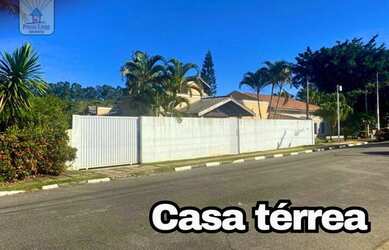 Imagem: A casa possui 3 Dormitórios, 5 Banheiros, 4 Vagas na garagem