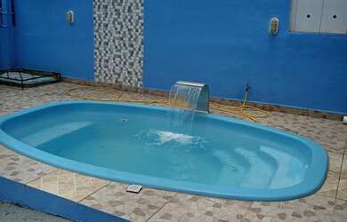 Imagem: A casa possui 3 Dormitórios, 1 Vaga na garagem e está localizado