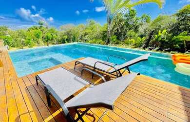 Imagem: A casa em condomínio possui 5 Dormitórios, 5 Banheiros, 4