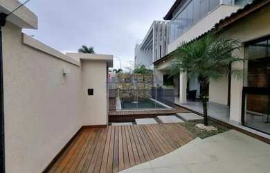 Imagem: A casa em condomínio possui 4 Dormitórios, 5 Banheiros, 268m²