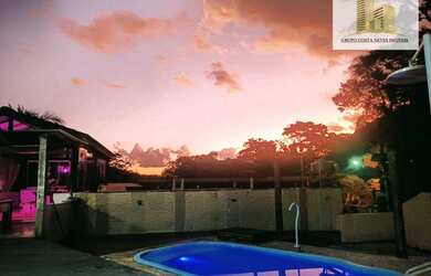 Imagem: A casa possui 5 Dormitórios, 3 Banheiros, 4 Vagas na garagem