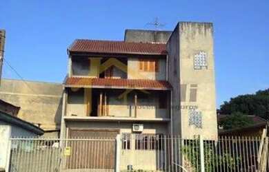 Imagem: A casa possui 5 Dormitórios, 4 Banheiros, 5 Vagas na garagem