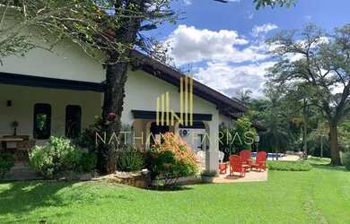 Imagem: A casa em condomínio possui 5 Dormitórios, 5 Banheiros, 2