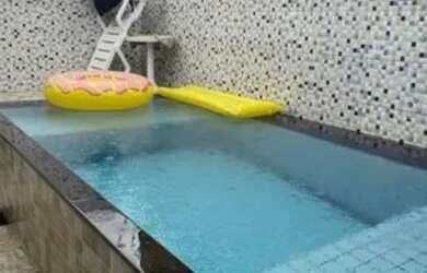 Imagem: A casa possui 3 Dormitórios, 3 Banheiros, 3 Vagas na garagem