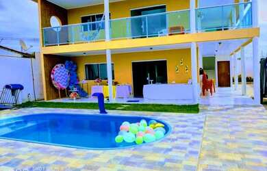 Imagem: A casa possui 5 Dormitórios, 5 Vagas na garagem e está localizado