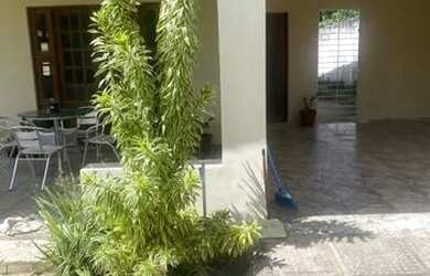 Imagem: A casa possui 5 Dormitórios, 5 Banheiros, 5 Vagas na garagem