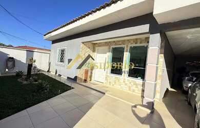 Imagem: A casa possui 5 Dormitórios, 2 Banheiros, 4 Vagas na garagem