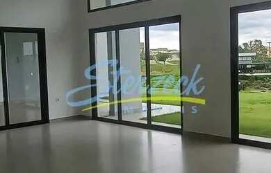 Imagem: A casa possui 3 Dormitórios, 4 Banheiros, 3 Vagas na garagem