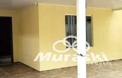 Imagem: A casa possui 3 Dormitórios, 1 Banheiro, 2 Vagas na garagem