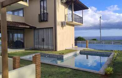 Imagem: A casa possui 2 Dormitórios, Acomodam 8 pessoas, 4 Vagas na