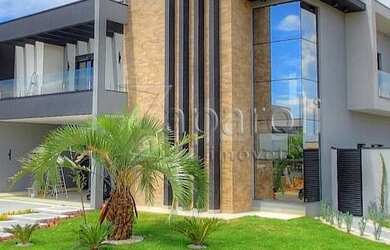 Imagem: A casa em condomínio possui 4 Dormitórios, 5 Banheiros, 4