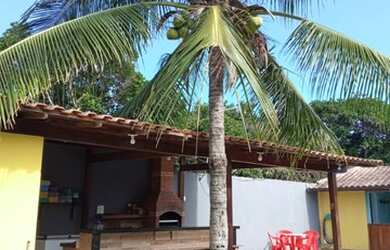 Imagem: A casa possui 4 Dormitórios, 5 Vagas na garagem e Imóvel mobiliado