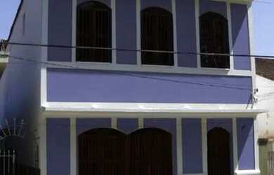 Imagem: A casa possui 5 Dormitórios, 3 Banheiros, 2 Vagas na garagem