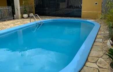 Imagem: A casa possui 4 Dormitórios, 4 Banheiros, 4 Vagas na garagem