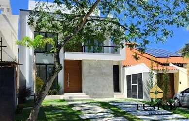 Imagem: A casa em condomínio possui 4 Dormitórios, 5 Banheiros, 2