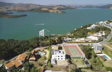 Imagem: A casa possui 5 Dormitórios, 5 Banheiros, 5 Vagas na garagem