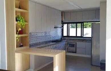 Imagem: A casa possui 4 Dormitórios, 3 Banheiros, 5 Vagas na garagem