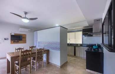 Imagem: A casa possui 4 Dormitórios, 5 Vagas na garagem, Imóvel novo