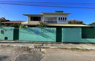 Imagem: A casa possui 5 Dormitórios, 2 Banheiros, 2 Vagas na garagem