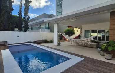 Imagem: A casa em condomínio possui 4 Dormitórios, 5 Banheiros, 4