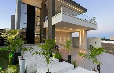 Imagem: A casa em condomínio possui 4 Dormitórios, 5 Banheiros, 4