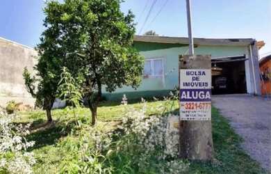 Imagem: A casa possui 3 Dormitórios, 2 Banheiros, 2 Vagas na garagem
